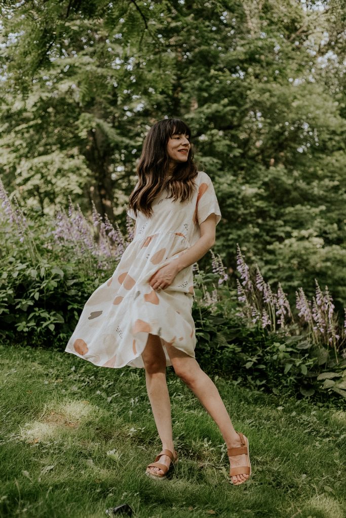 Linen Tent Dress with Flatform Sandals on woman standing in the grass